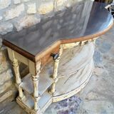 Wood console and polished steel top