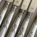 Set of 8 silver metal knives