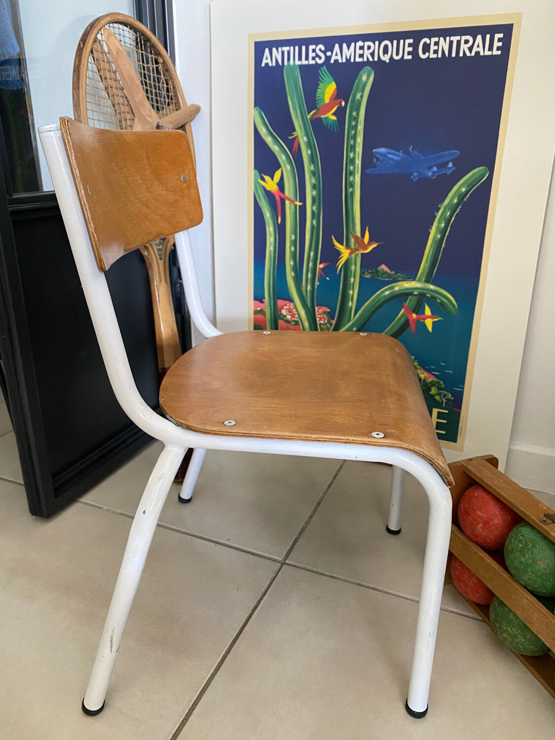 Old wooden and metal children's school chair