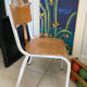 Old wooden and metal children's school chair