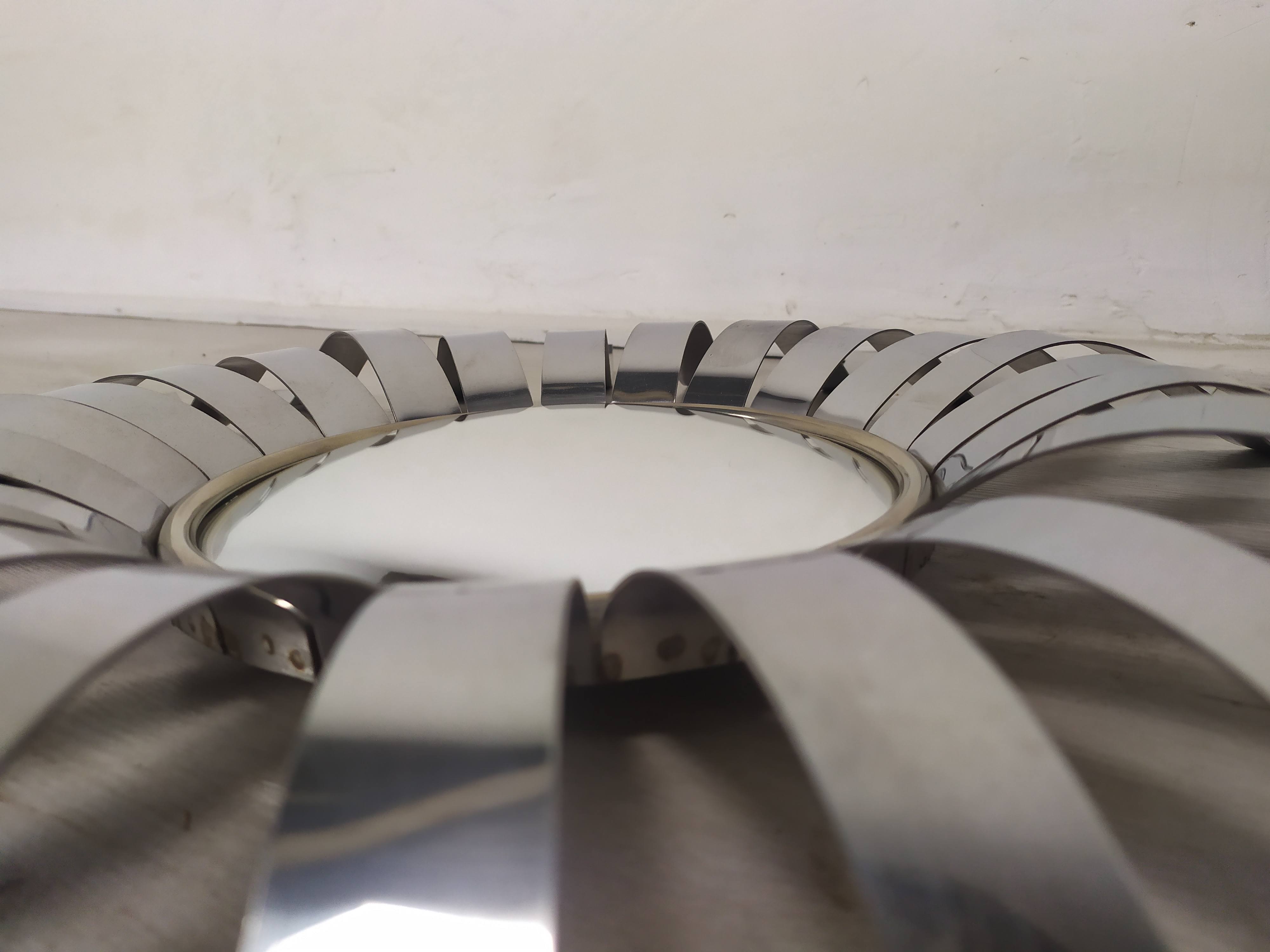 Stainless steel sun mirror 1970