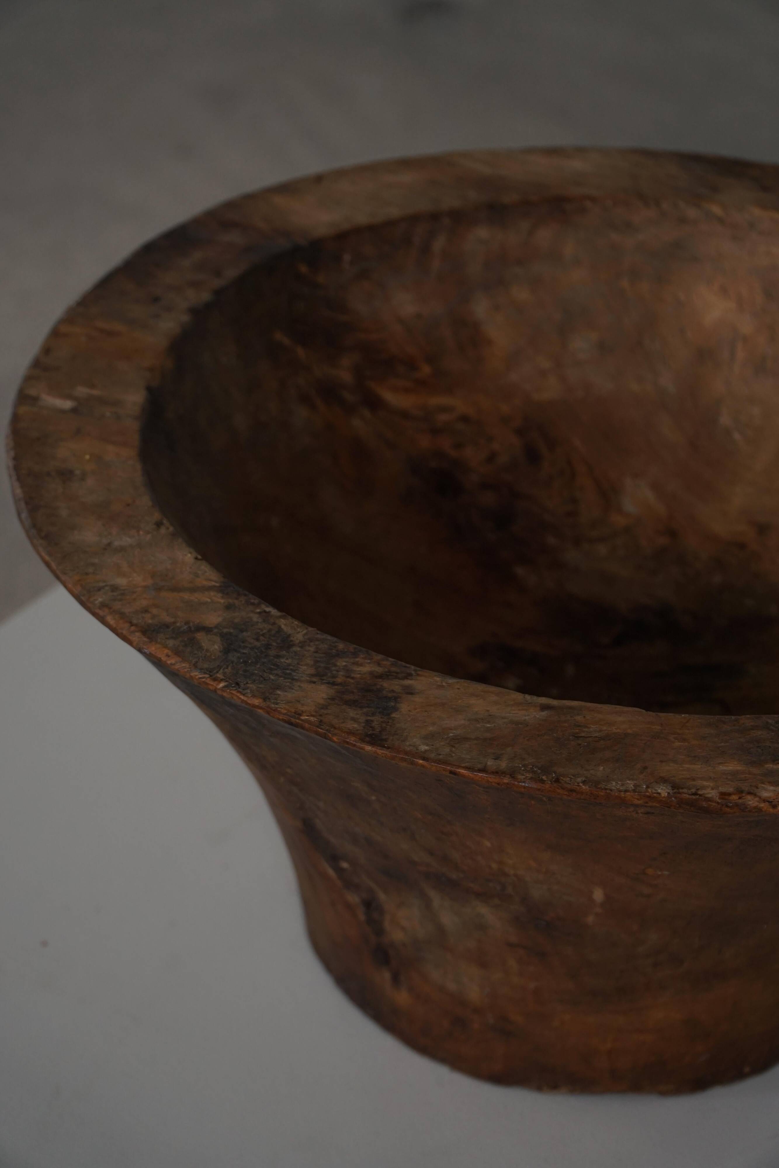 Large hand-carved African wooden bowl, mid-20th century.
