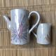 Set of 1 jug and 1 milk jug signed La Roue Vallauris.