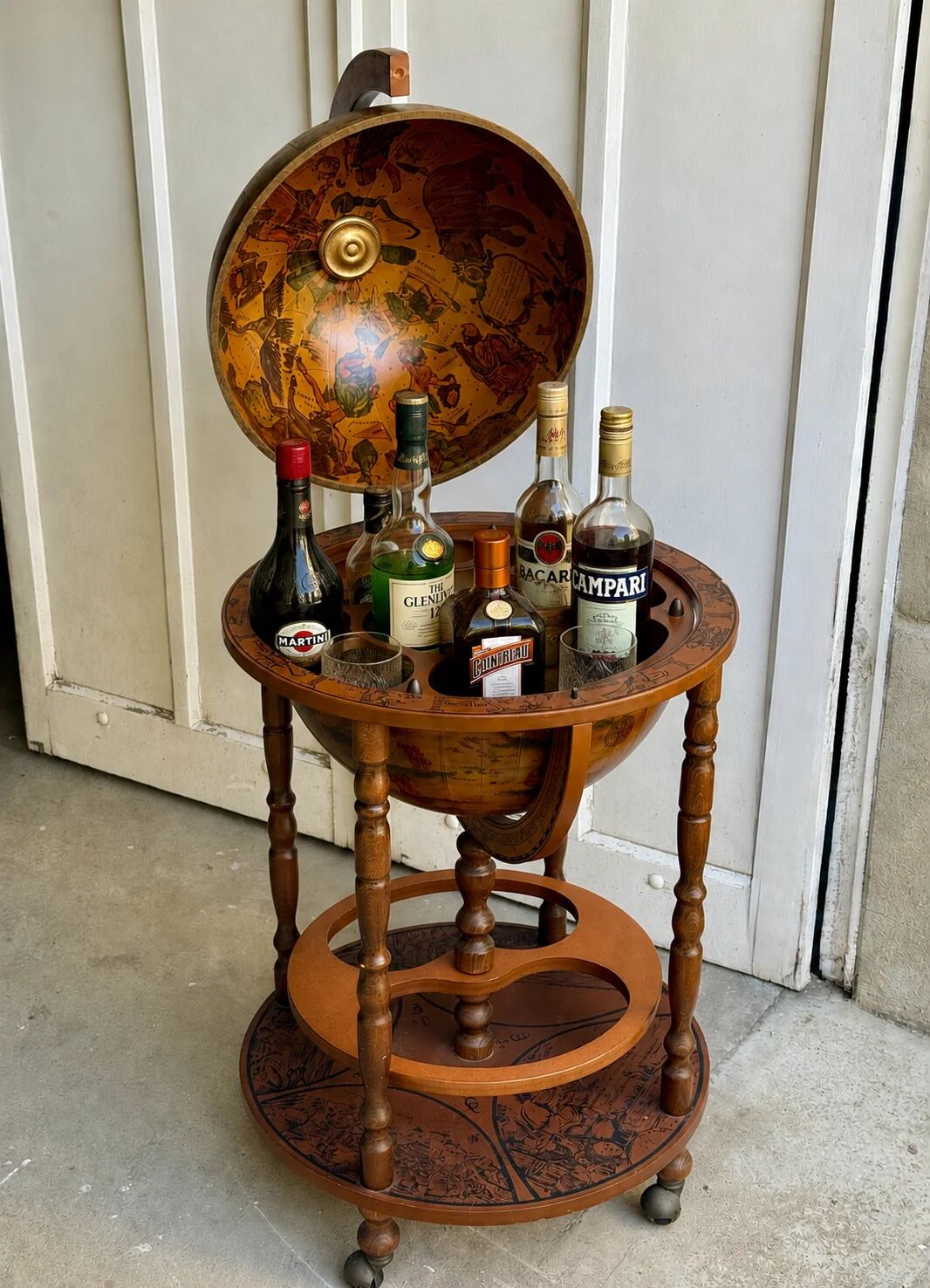 Globe bar on wheels with a rotating tray