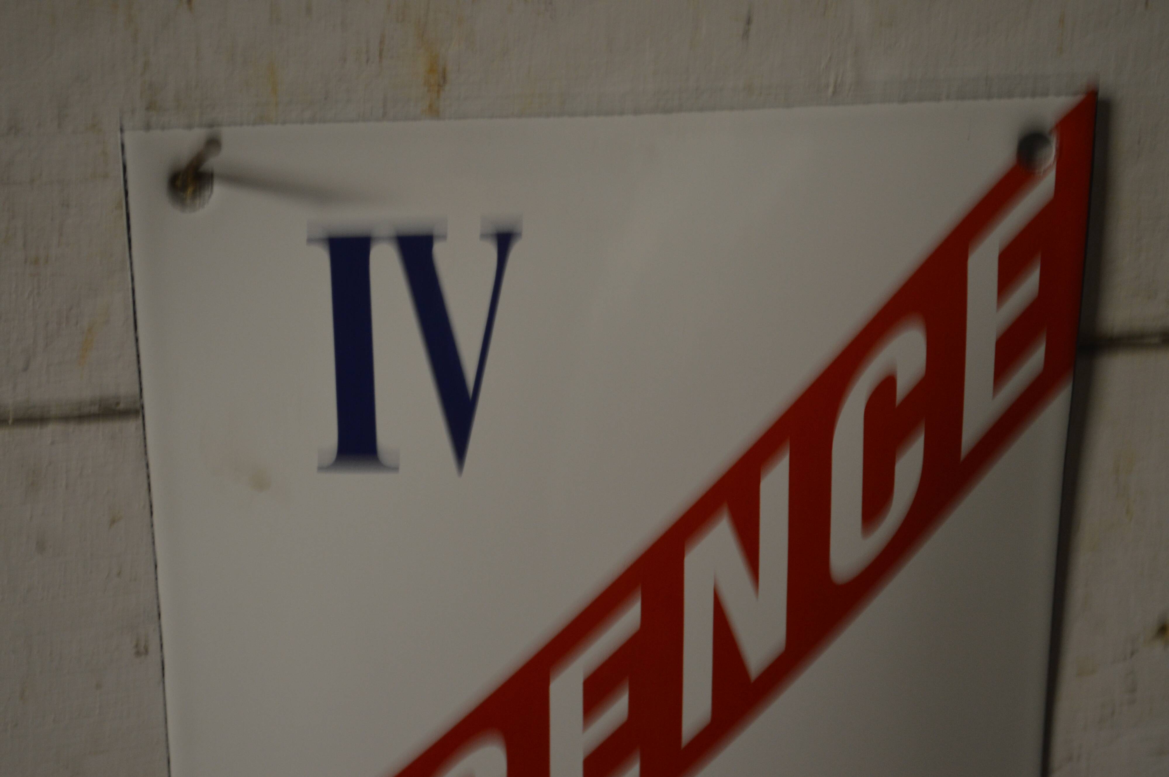 Enamel plate license IV