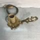 Former hand candleholder in golden bronze electrified vintage lamp