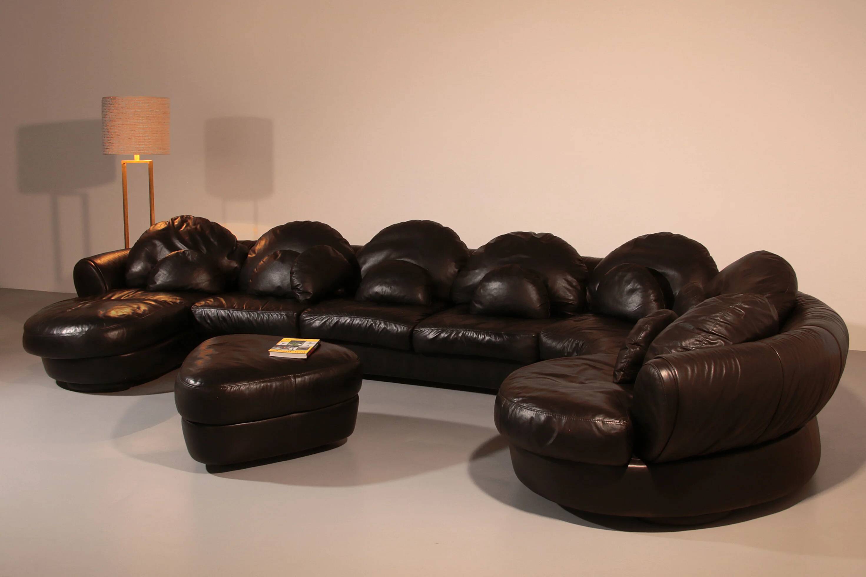 Organically shaped post-modern sectional sofa in black leather