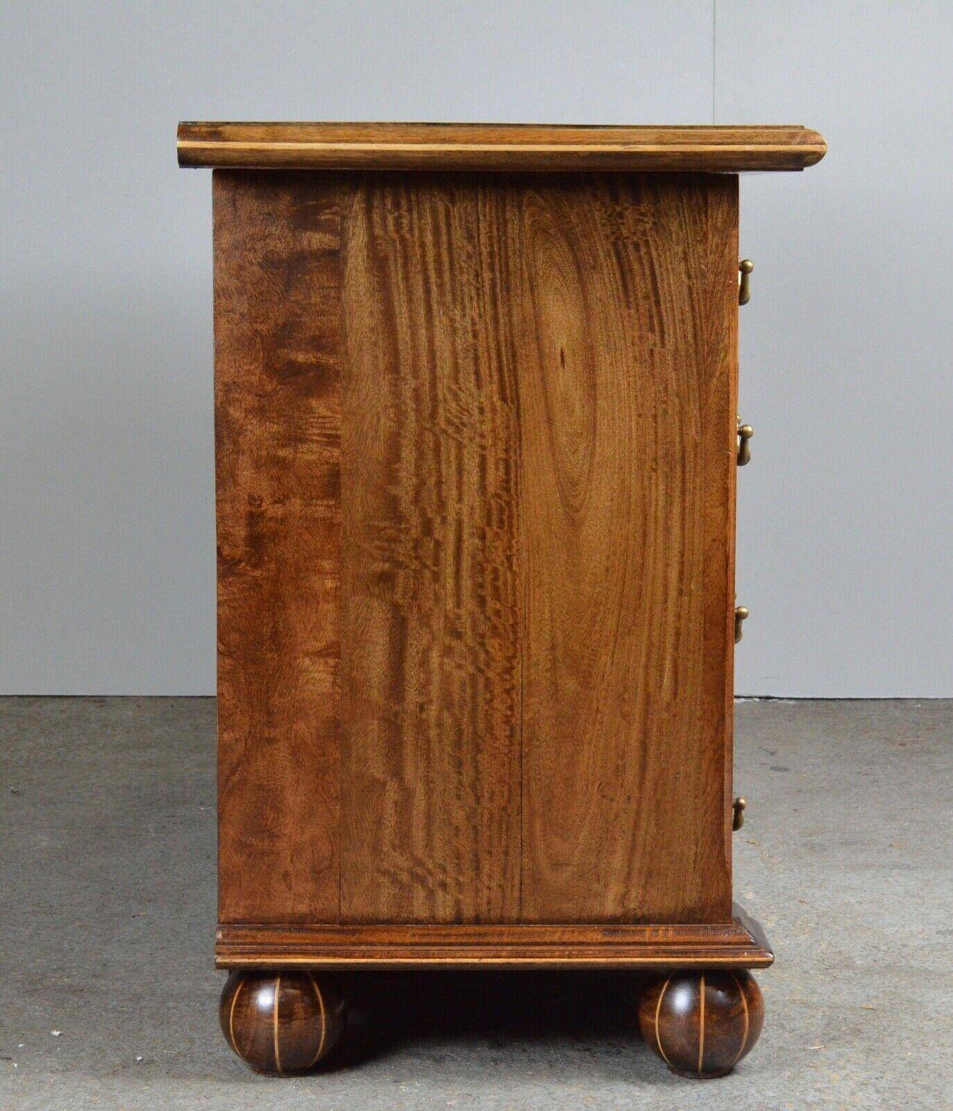 Rustic walnut sideboard with inlaid parquetry, vintage quality.