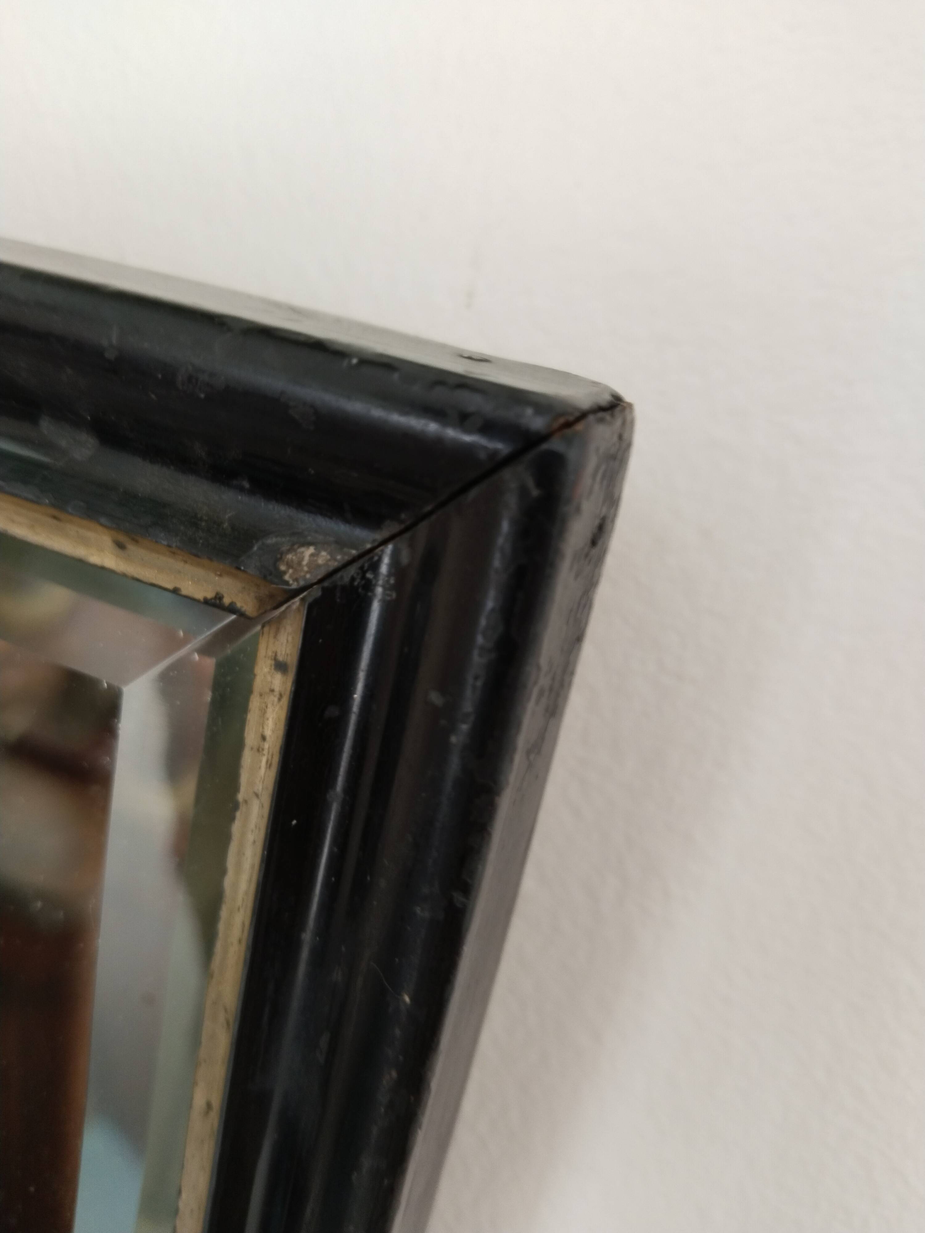 Antique Napoleon III beveled mirror, black and gold