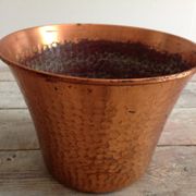 Cache hammered copper pot