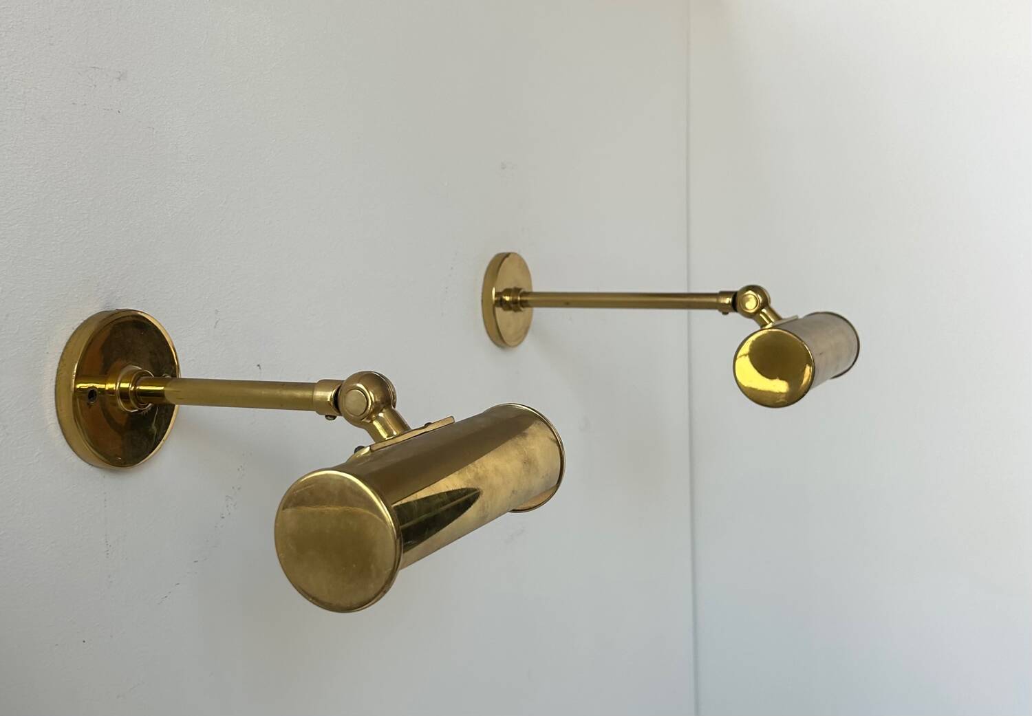 Pair of vintage adjustable wall lights, solid brass, France 1950