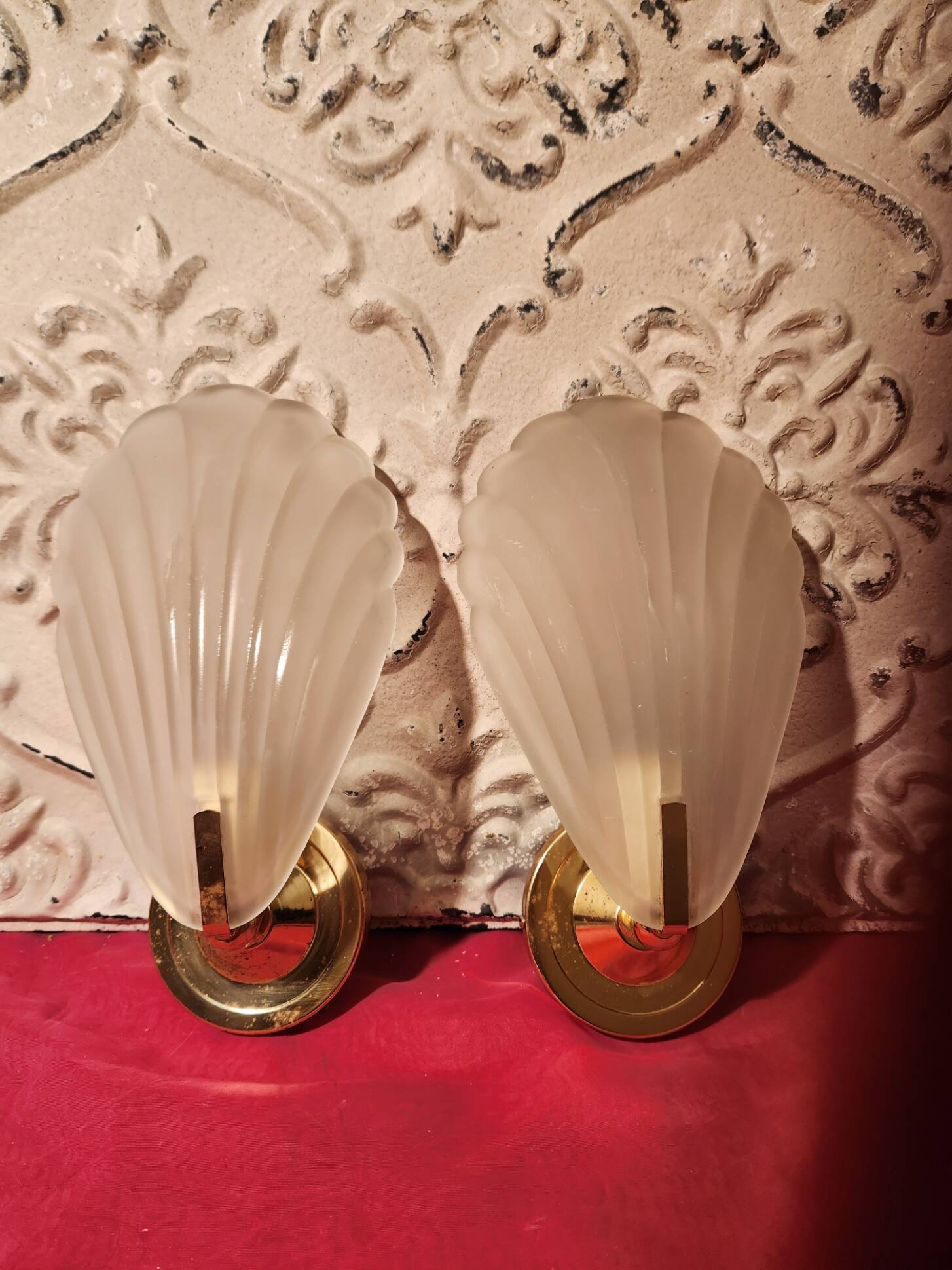 Pair of vintage brass wall lights with opaque glass shells