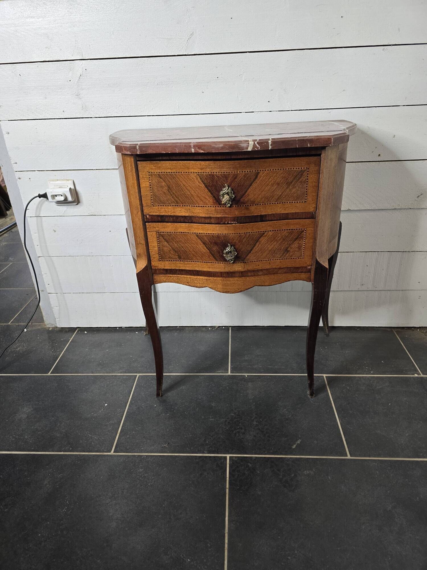 Curved chest of drawers in Louis XV style marquetry