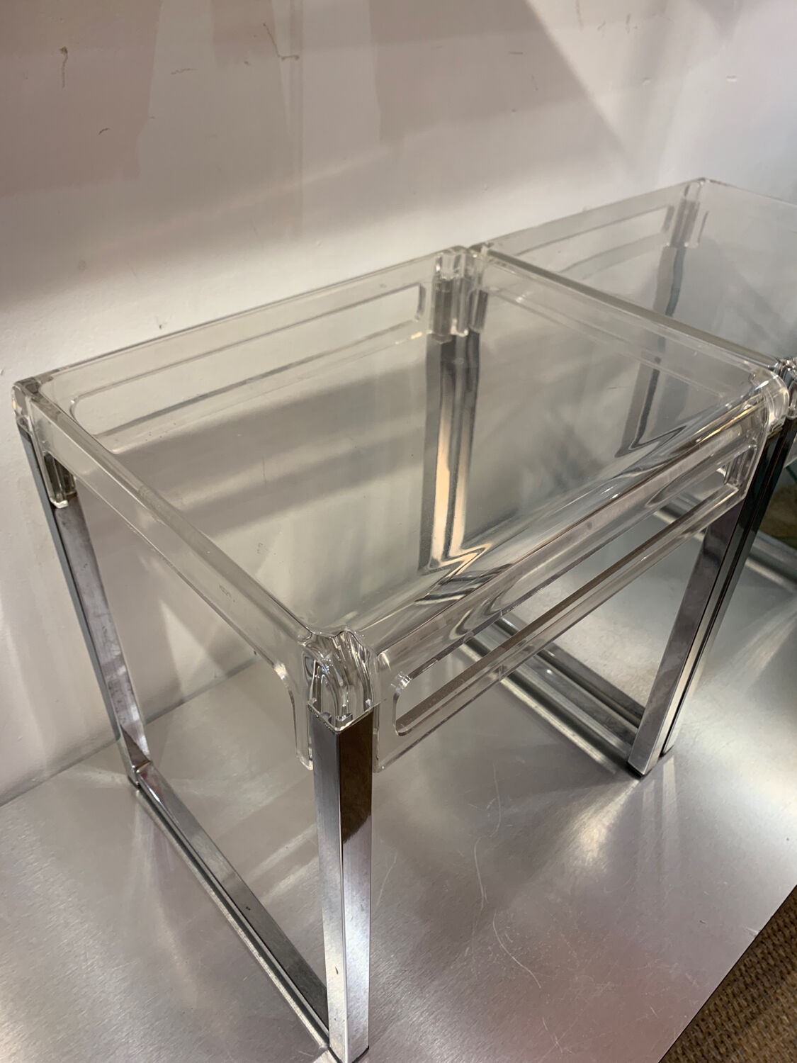 Pair of vintage chrome and acrylic glass bedside tables