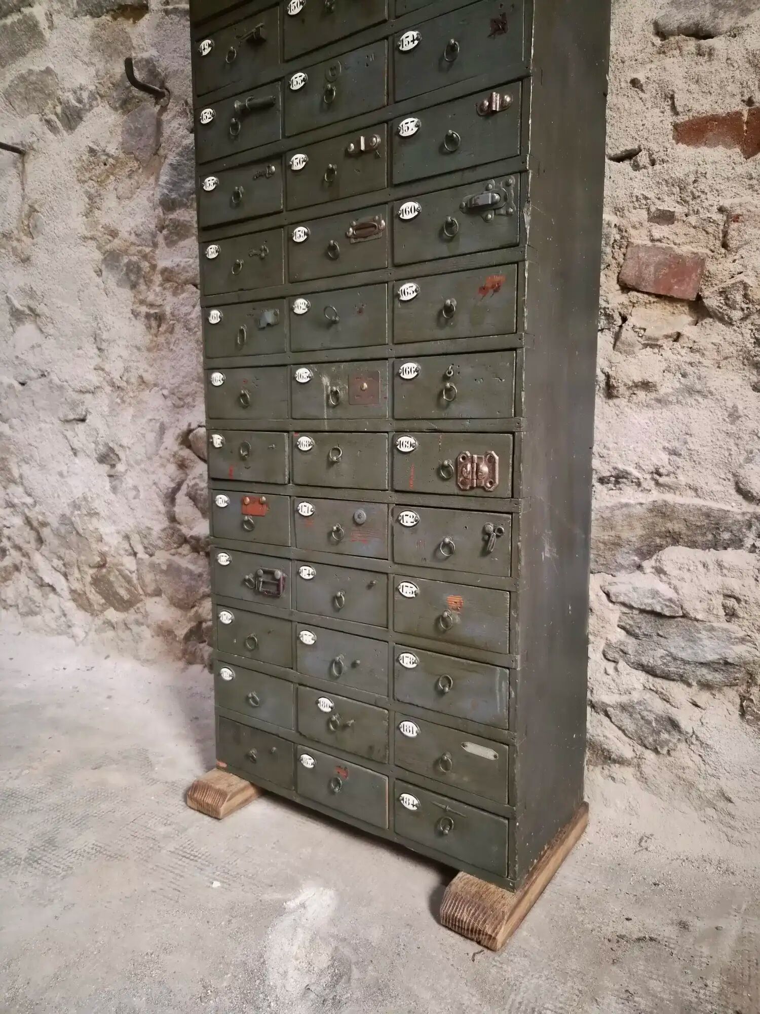 Antique hardware cabinet with 48 drawers, circa 1900.