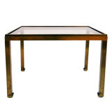 Pair of tables in golden brass