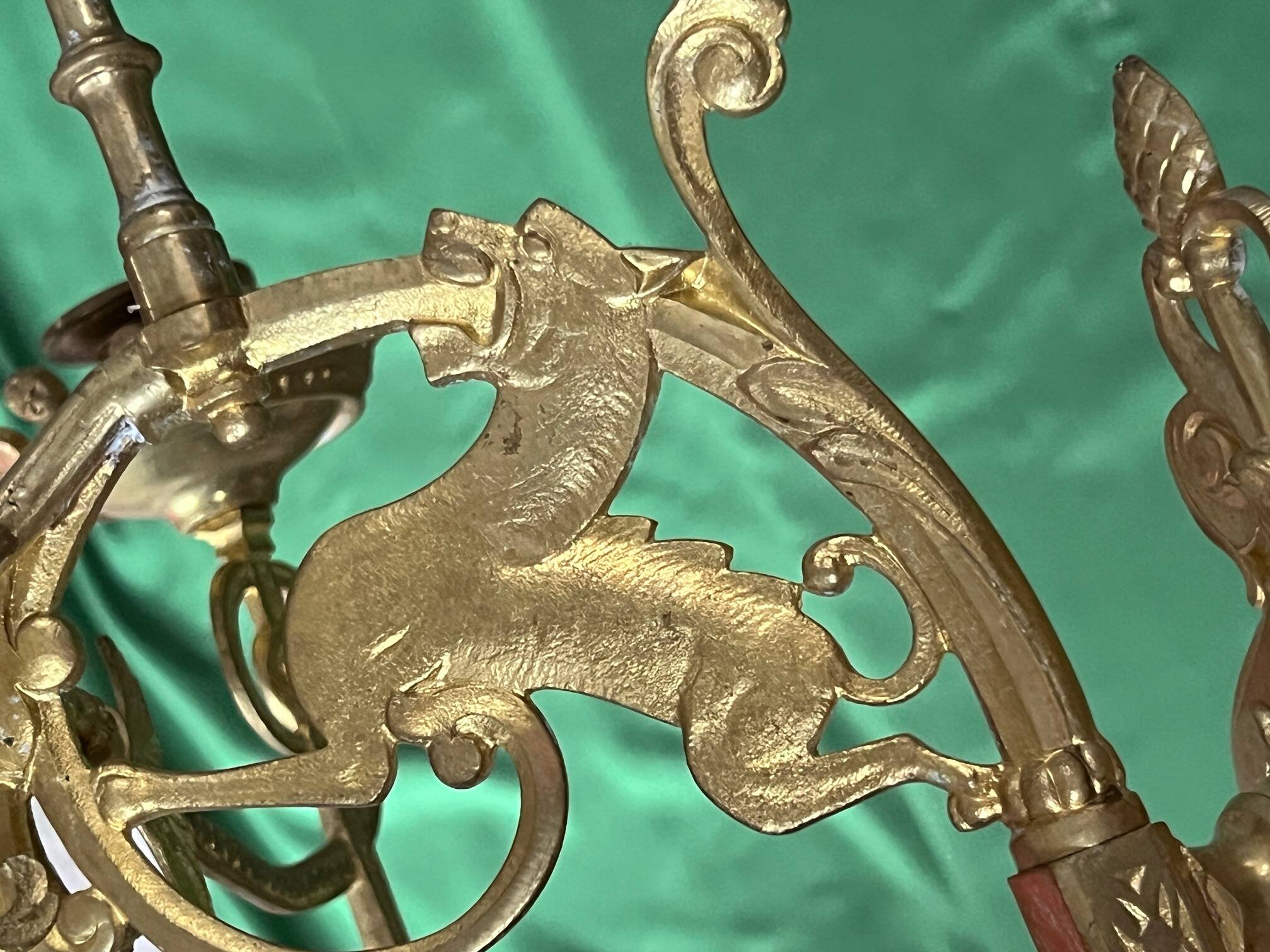 Pair of neo-Gothic wall sconces. Solid gilt bronze.