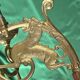 Pair of neo-Gothic wall sconces. Solid gilt bronze.