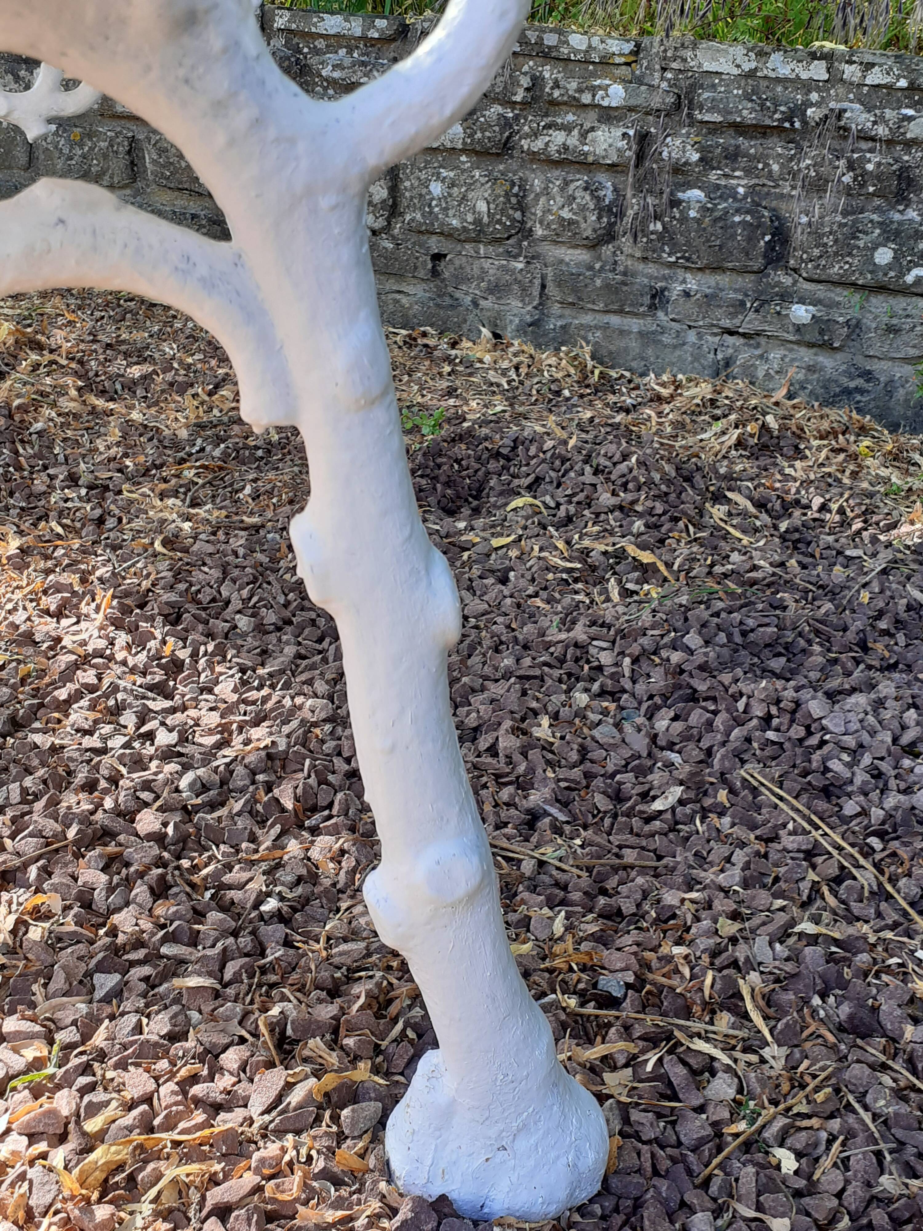 Old garden bench with cast iron feet and wooden planks