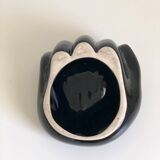 Empty black enamelled hand-shaped ceramic pocket, 1970