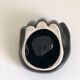 Empty black enamelled hand-shaped ceramic pocket, 1970