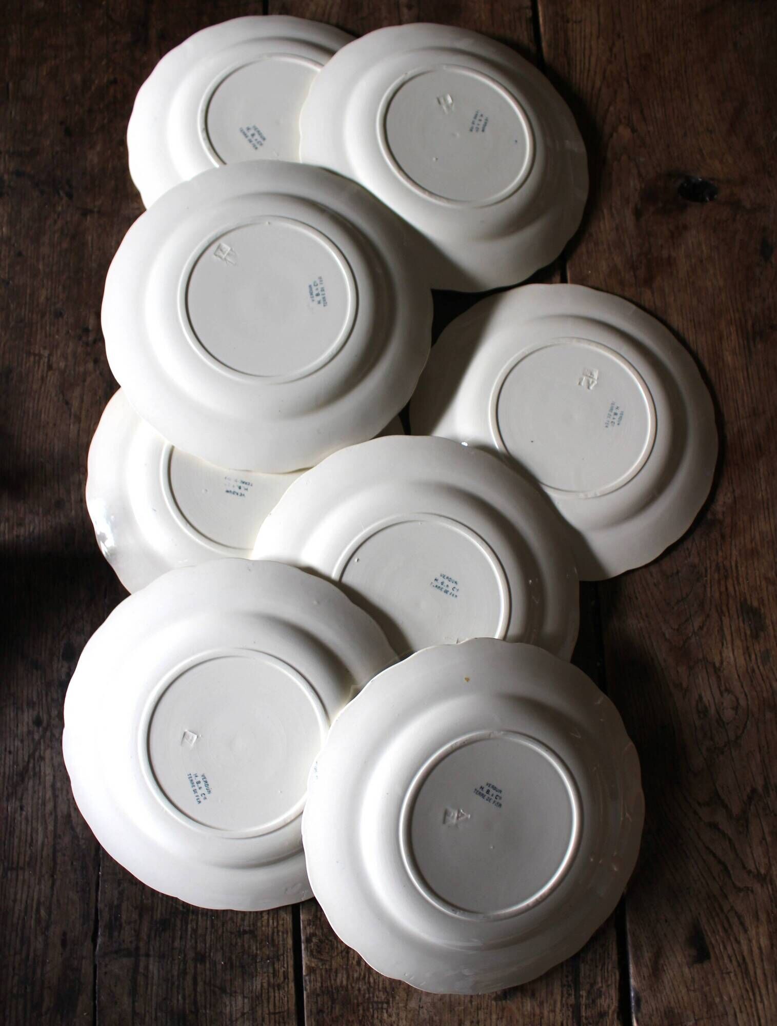 A set of 8 flat plates Terre de Fer Bleu Verdun HBC.