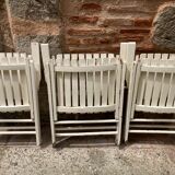 Five wooden garden armchairs