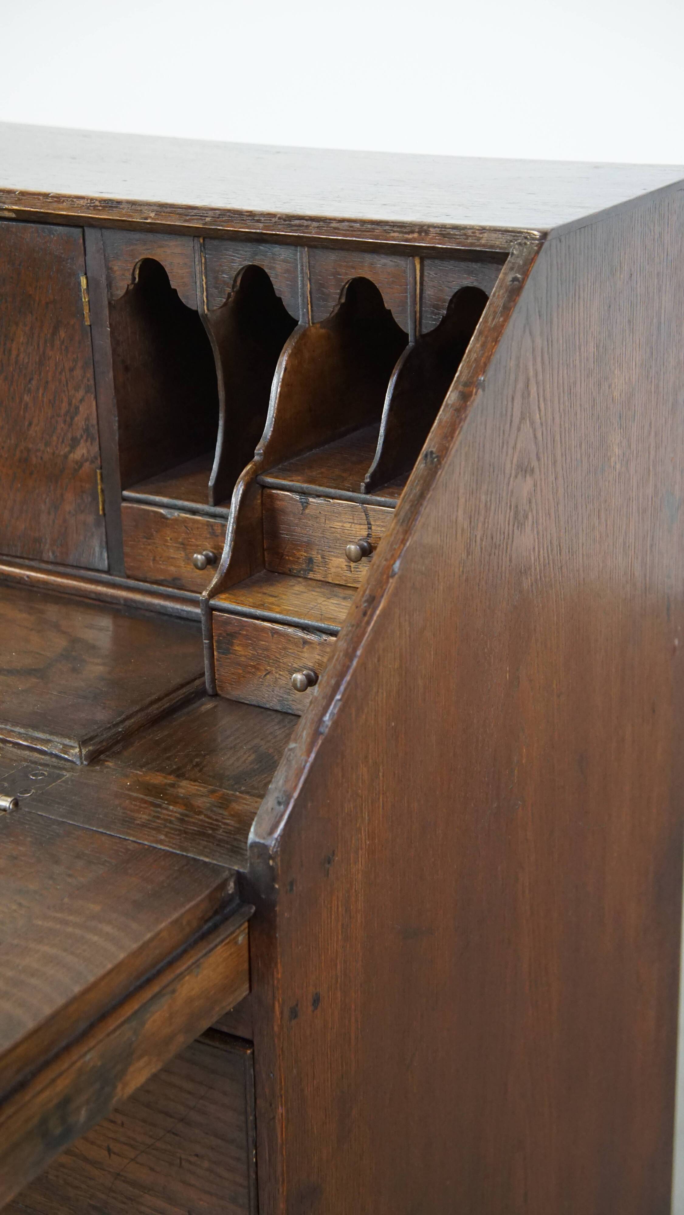 Antique subtle English secretaire from the early 19th century