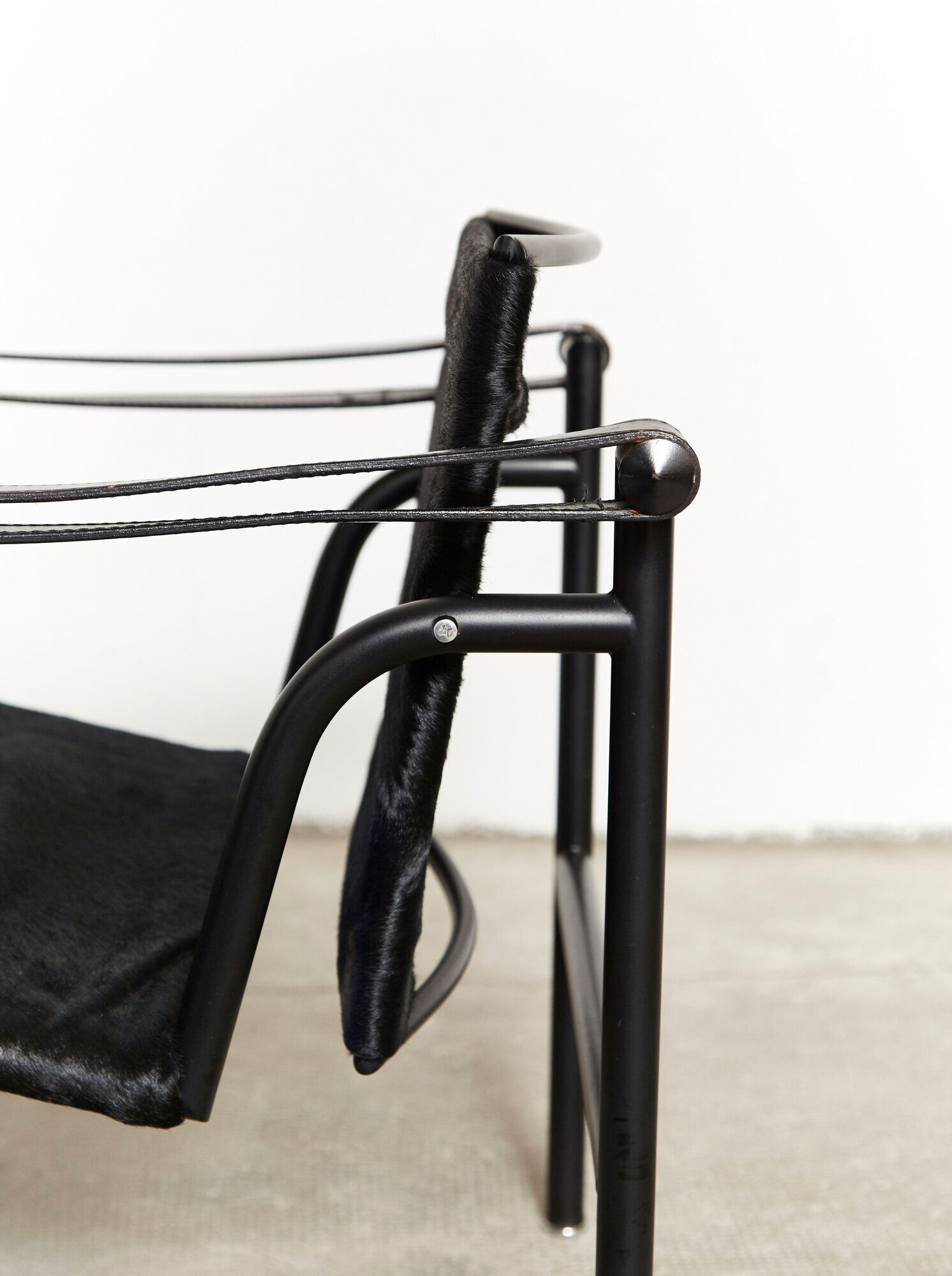 LC1 armchair by Le Corbusier, Perriand, & Jeanneret for Cassina