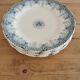 Service de 5 assiettes vintage en Terre de Fer