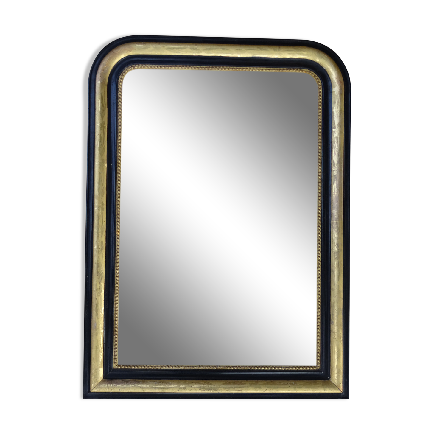 Louis Philippe mirror in blackened and gilded wood, 74 x 102 cm