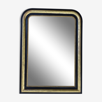Miroir Louis Philippe en bois noirci et doré à la feuille, 74 x 102 cm