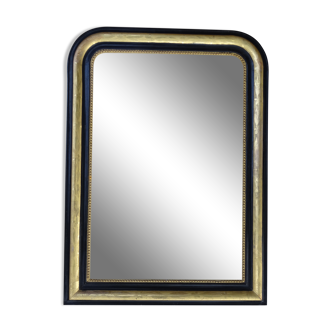 Louis Philippe mirror in blackened and gilded wood, 74 x 102 cm