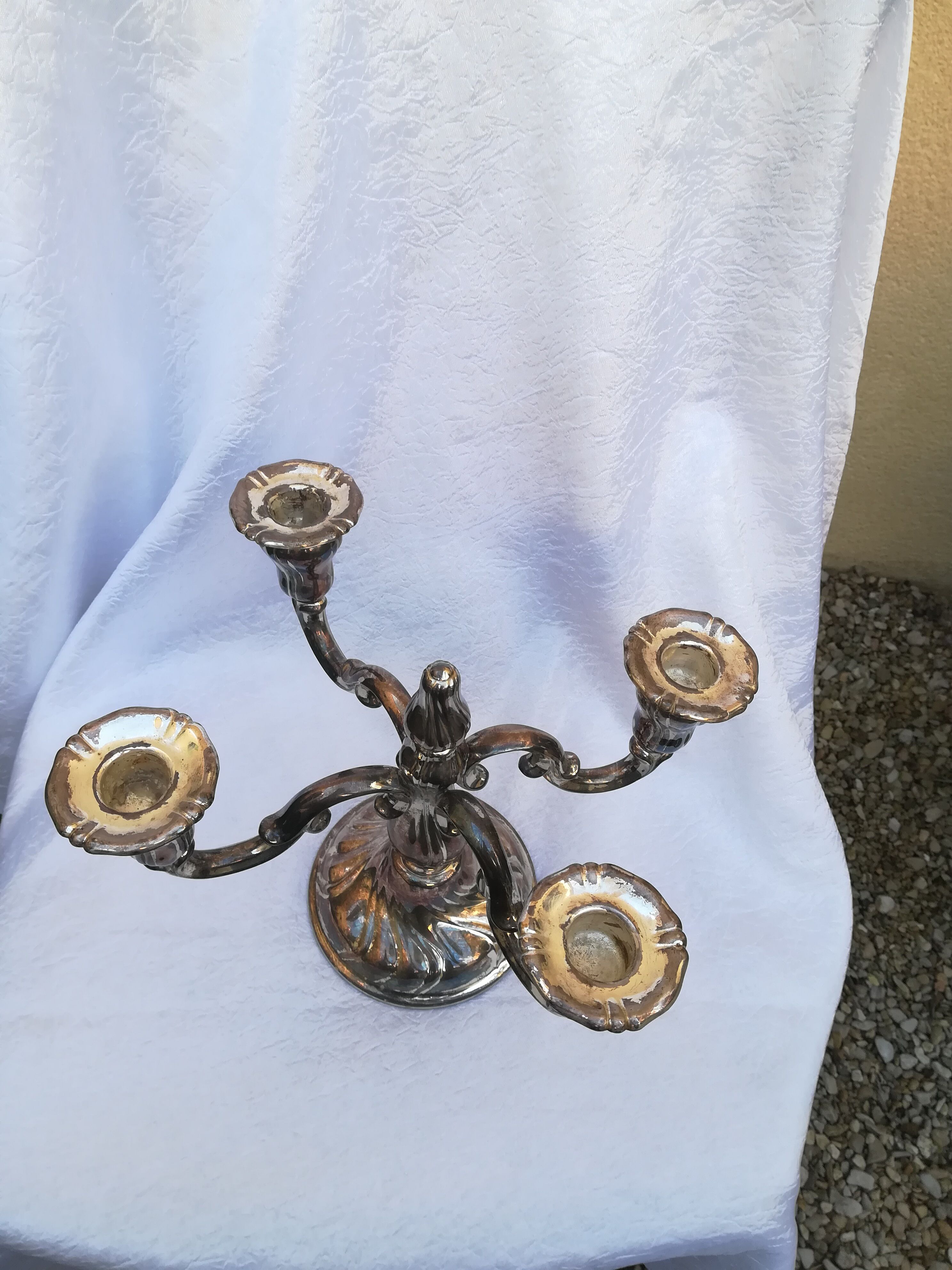 Pair of candlesticks in silver metal