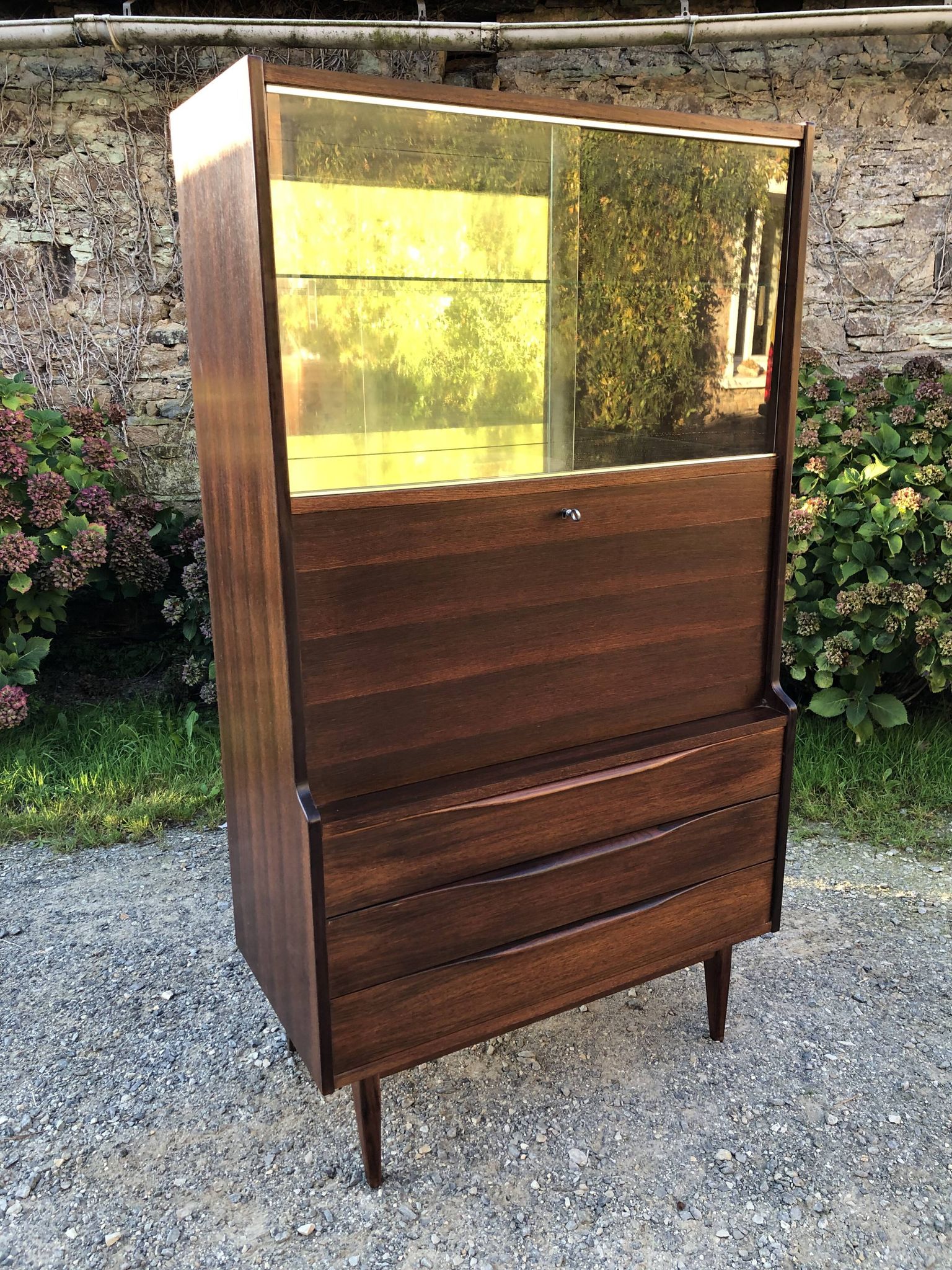 Vintage Scandinavian secretary in rosewood with drawers featuring fin-style handles.