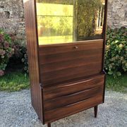 Vintage Scandinavian secretary in rosewood with drawers featuring fin-style handles.