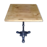 Bistro table feet in iron cast and solid wood tray