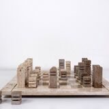 Modernist two-tone travertine chess set, Italy, 1970s