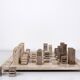 Modernist two-tone travertine chess set, Italy, 1970s