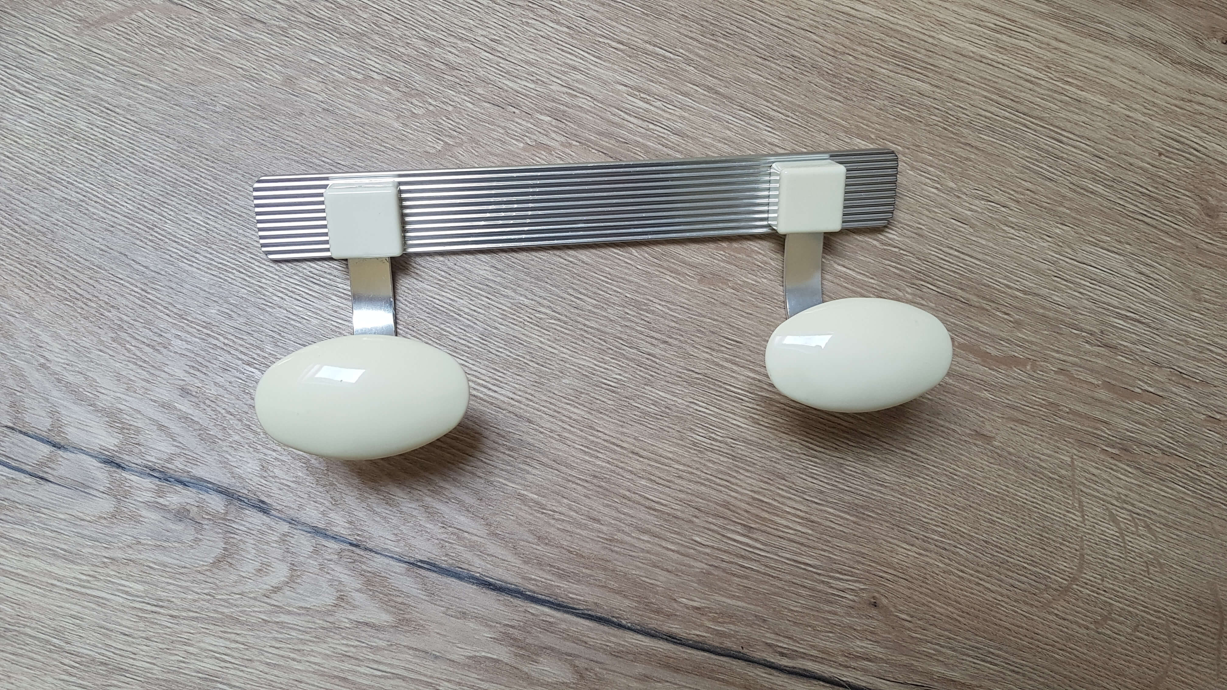 Metal coat rack and bakelite - seventies