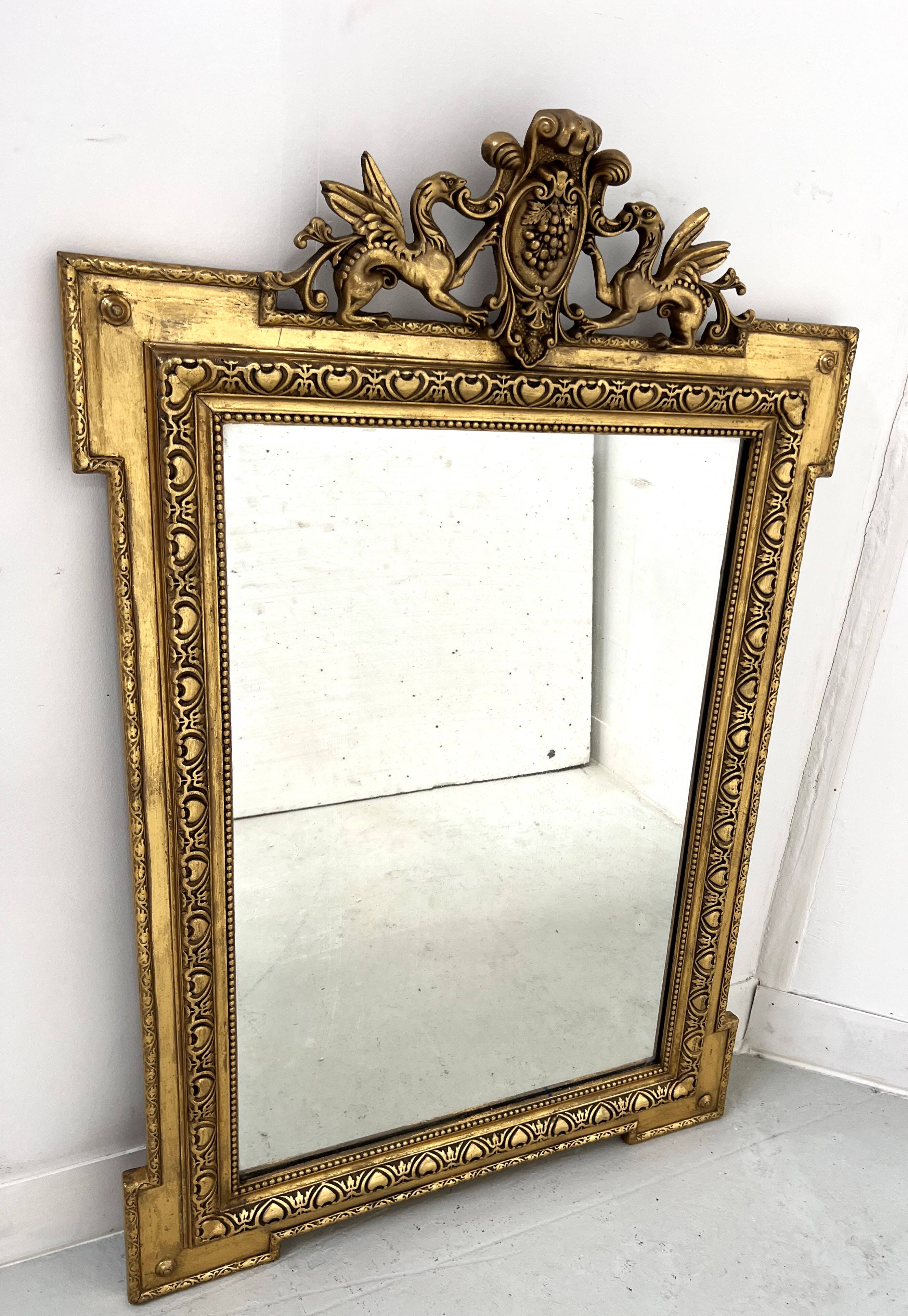 Louis XVI style mirror in wood and gilded stucco, 19th century