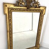 Louis XVI style mirror in wood and gilded stucco, 19th century