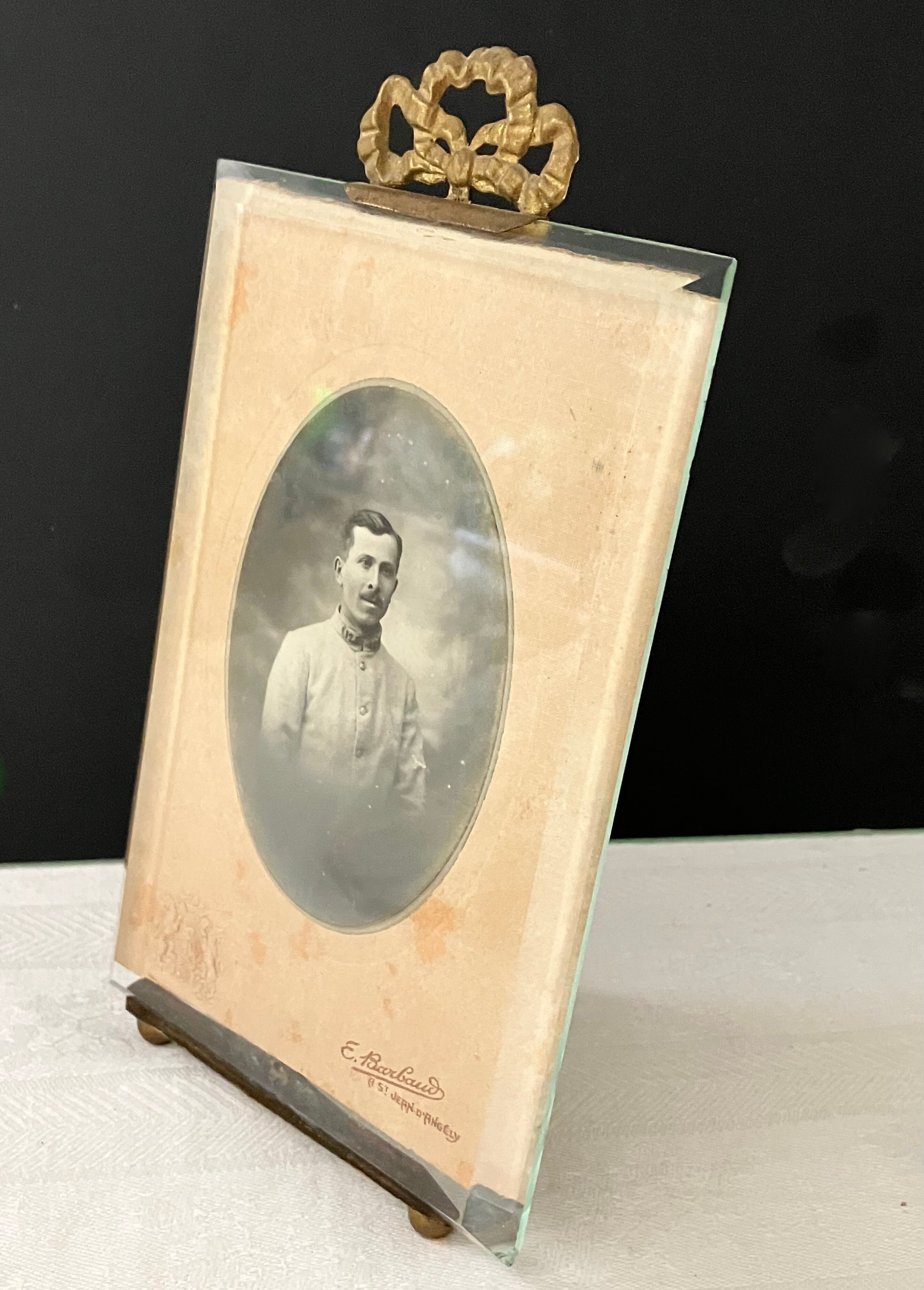 Brass frame, bevelled glass