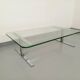 Vintage coffee table in transparent glass and cast aluminum from the 70s