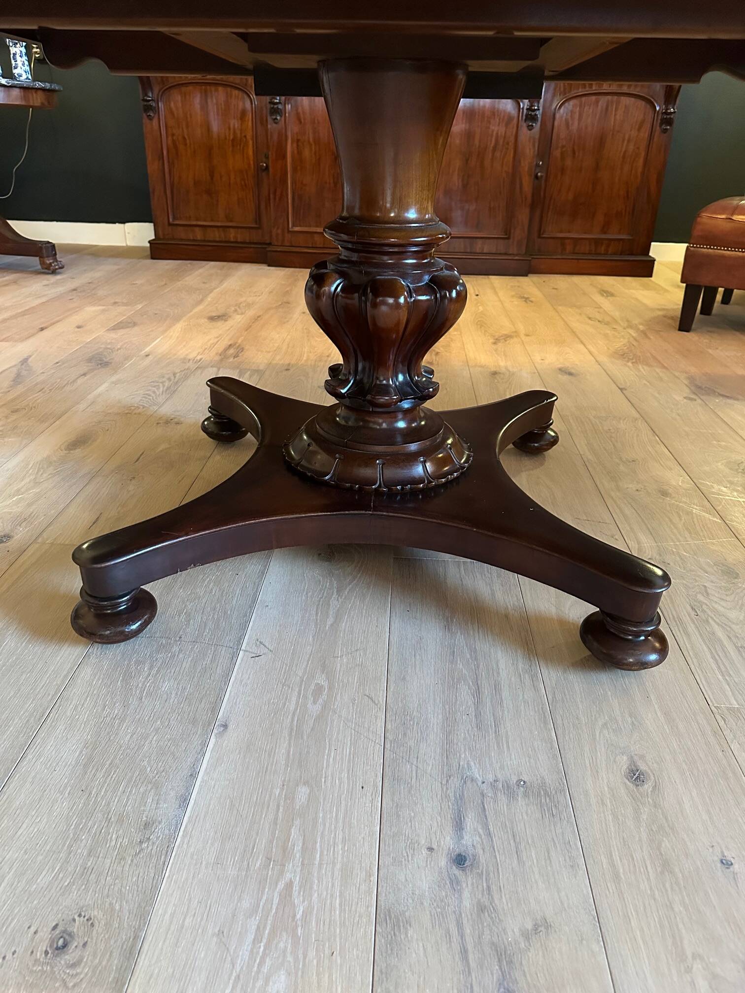 19th century almost square antique mahogany dining table.