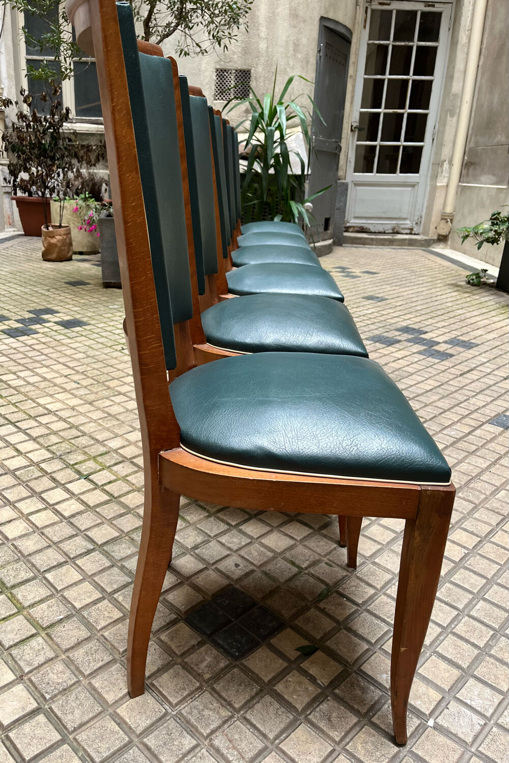 Green art deco chairs in skaï and wood