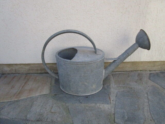 Old zinc watering can