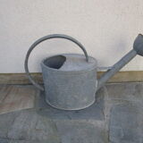 Old zinc watering can