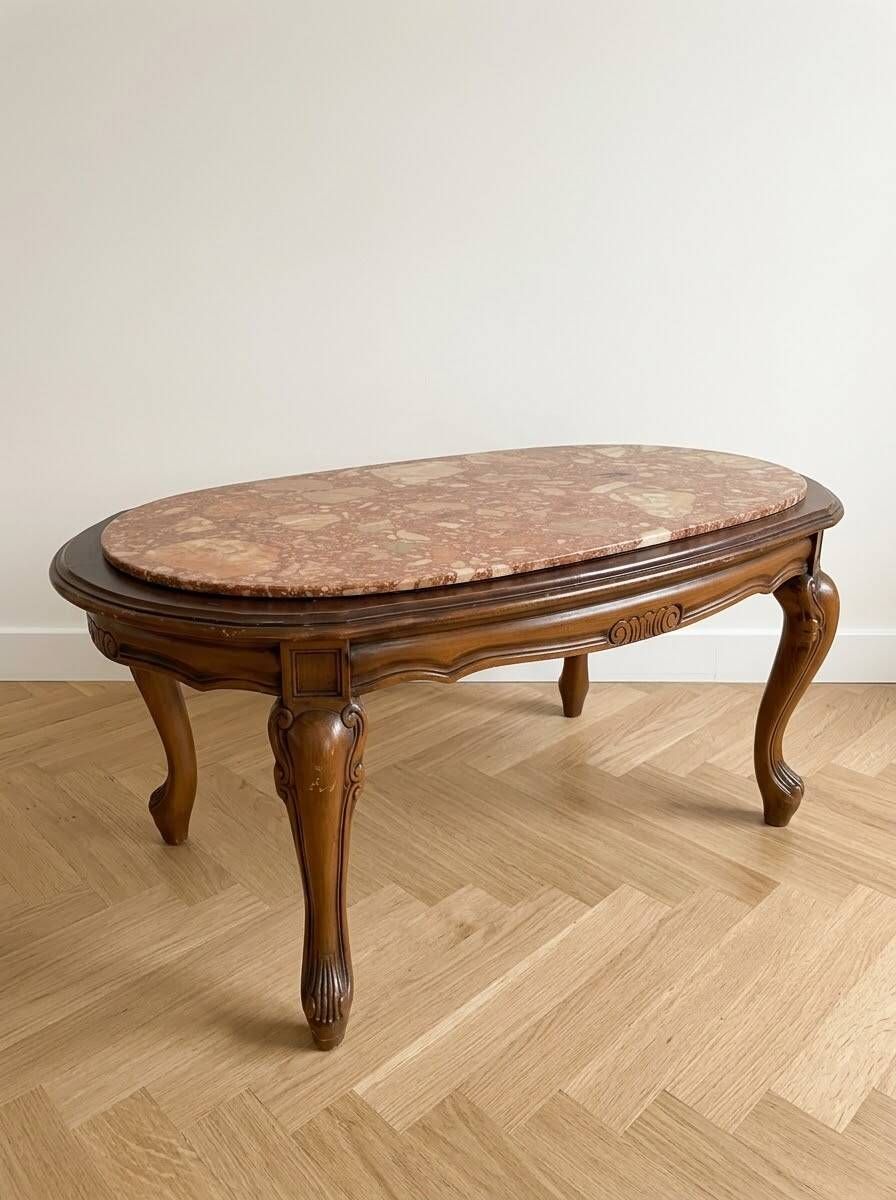Table basse ovale en marbre et bois sculpté style baroque