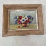 Painting bouquet of anemones in a vase.